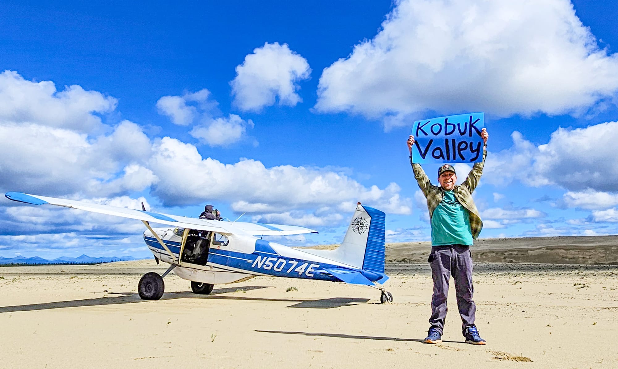 Professional Yosemite Guide Eric Kufrin landing on the Great Kobuk Sand Dunes in the Arctic Circle, proving 63/63 National Parks experience.